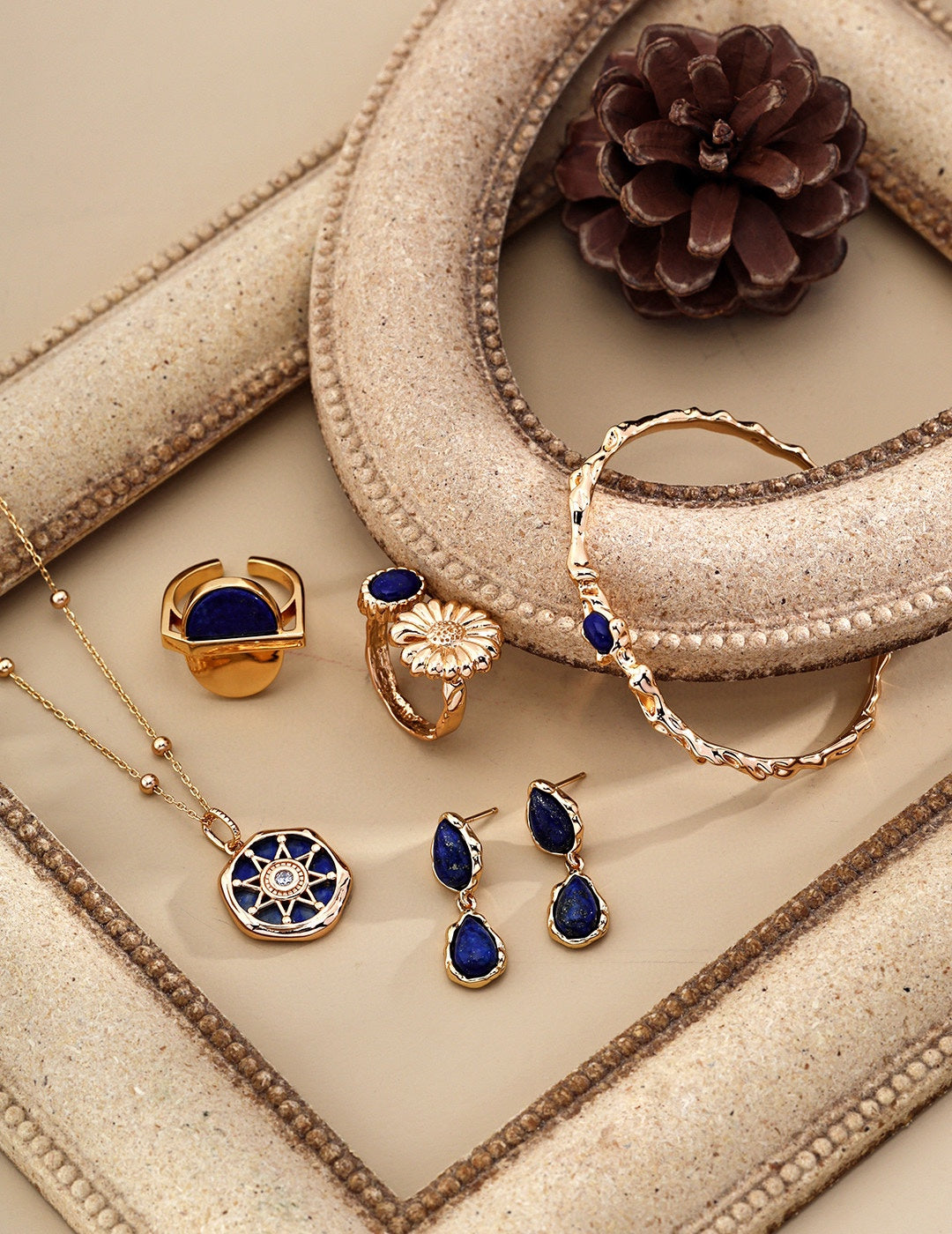 The Lapis Lazuli jewelry collection features rings, earrings, bracelets, and necklaces, each incorporating the deep blue essence of lapis lazuli.